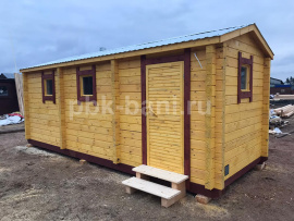 Перевозная баня из бруса «Дарьяна» 6x2,4 м с доставкой в Московскую область